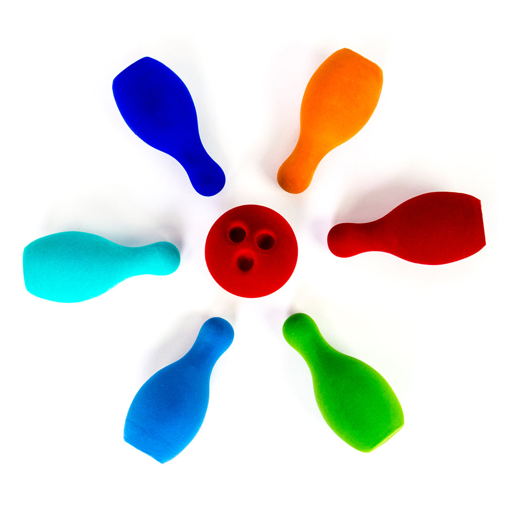 Seven piece Bowling Set with six colorful pins and one red bowling ball.