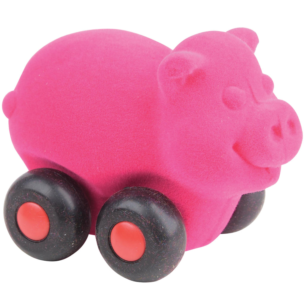 Pink pig aniwheelie with black wheels. 
