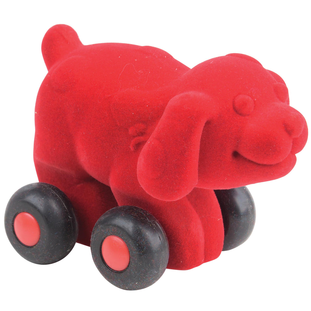 Red dog aniwheelie with black wheels. 